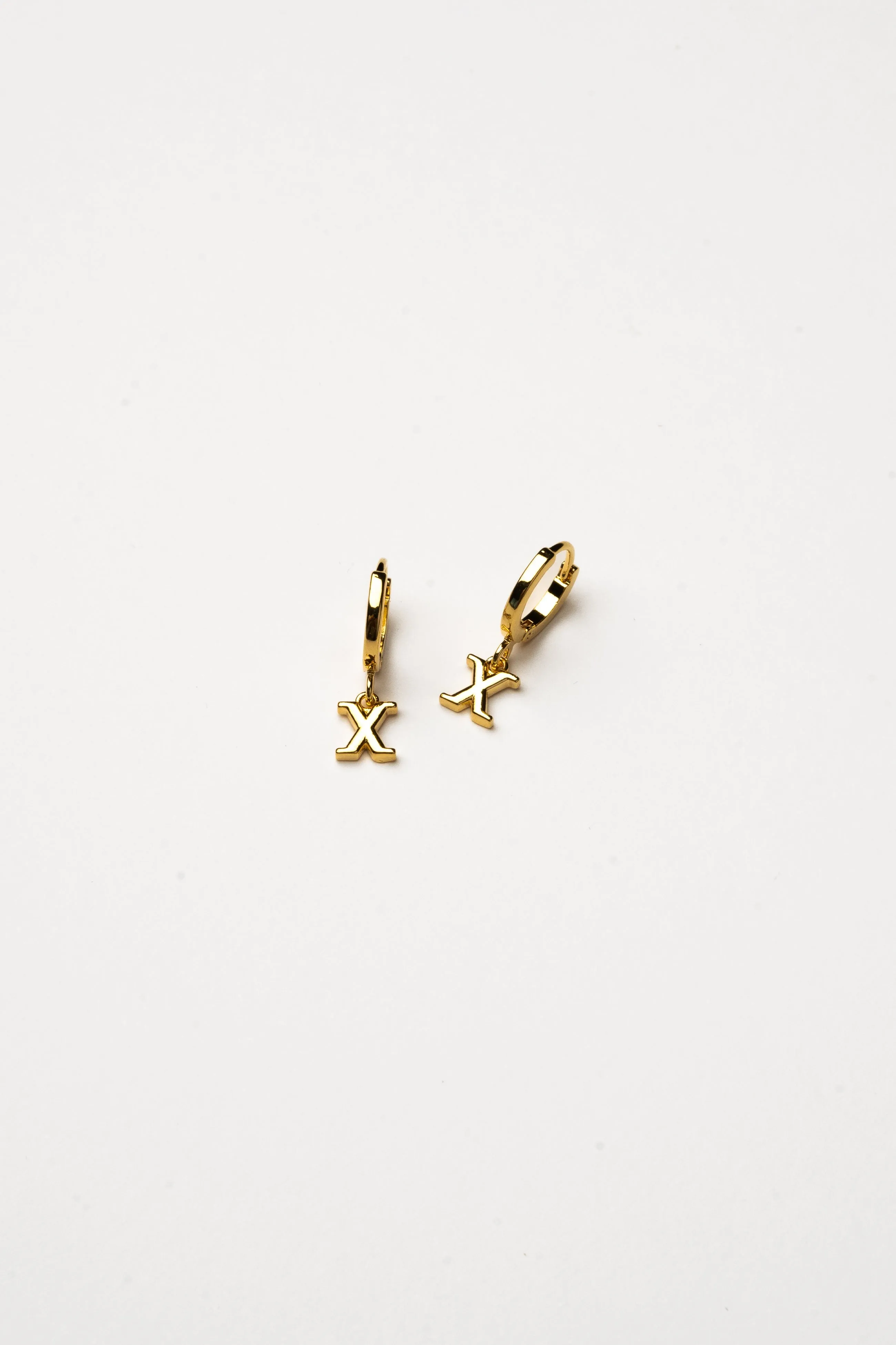 Cove Initial Letter Huggie Earrings