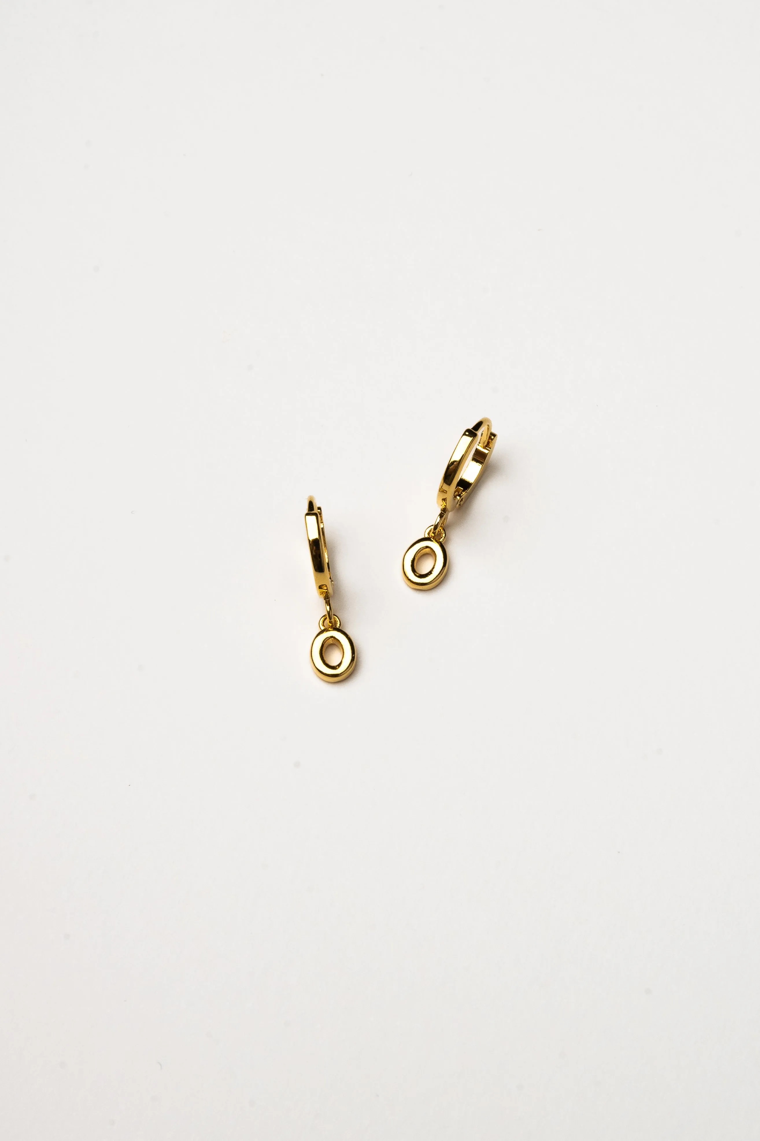 Cove Initial Letter Huggie Earrings