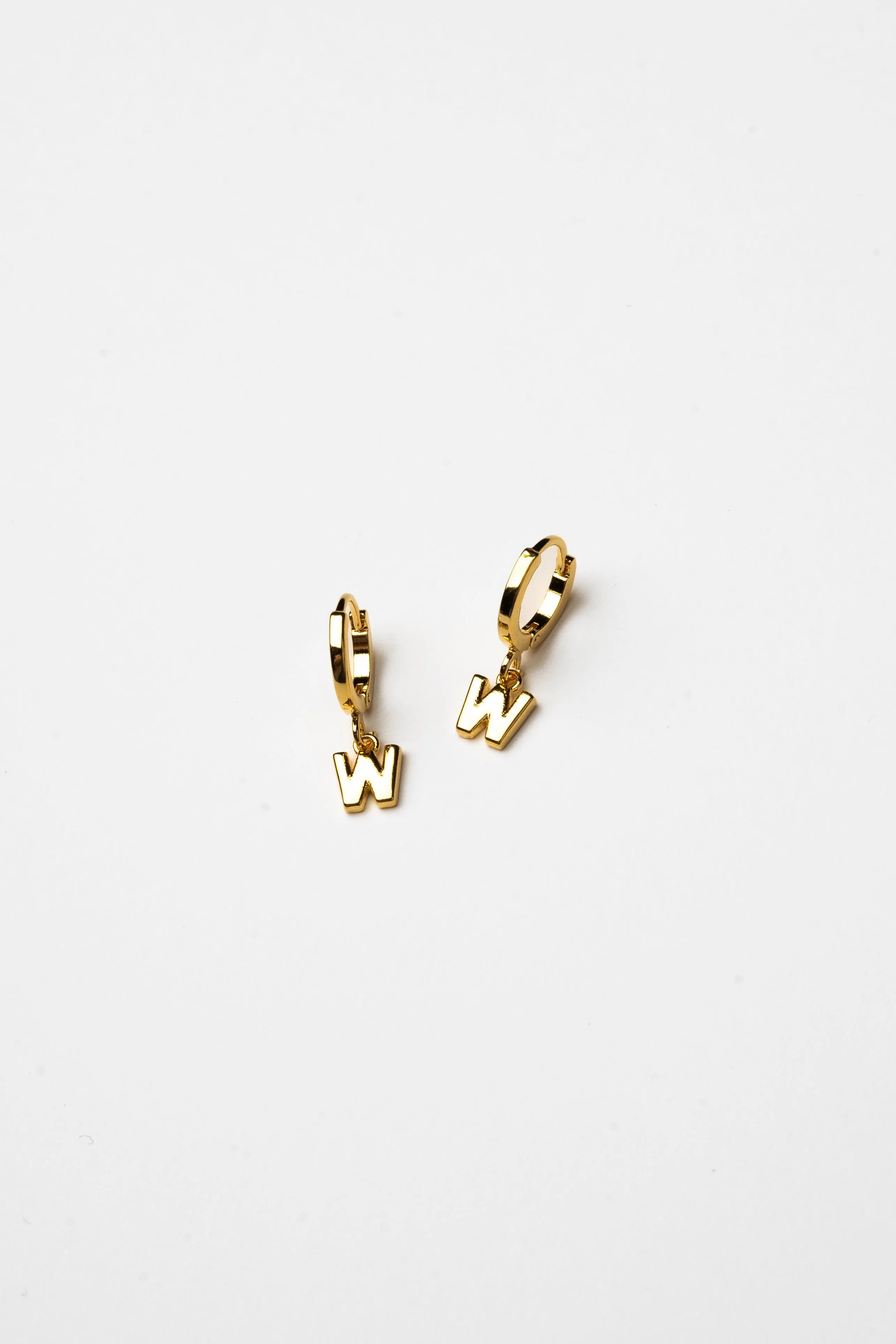 Cove Initial Letter Huggie Earrings